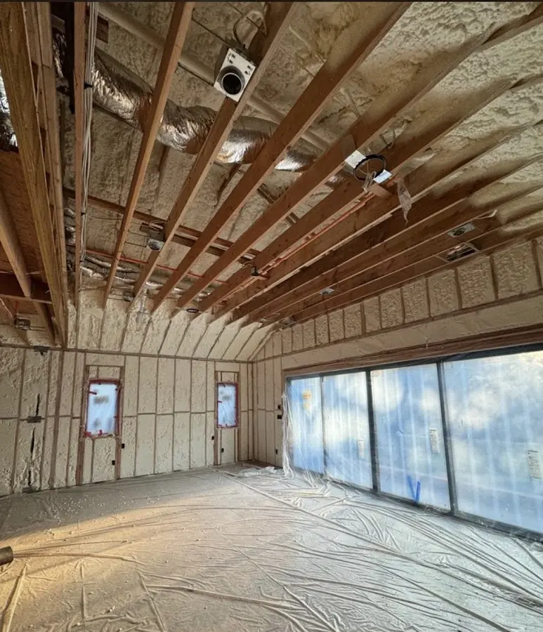 Interior walls and ceiling insulated with spray foam during new construction in Fortuna Foothills
